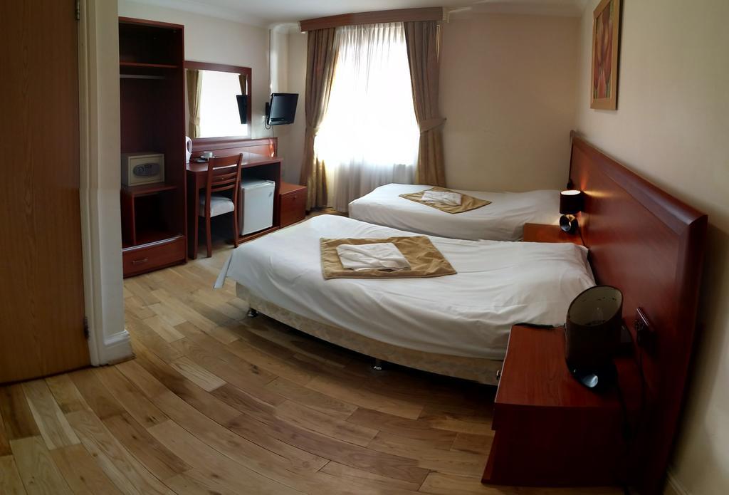 Corner House Hotel Londres Quarto foto