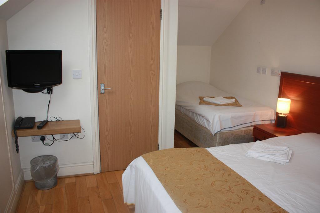 Corner House Hotel Londres Quarto foto